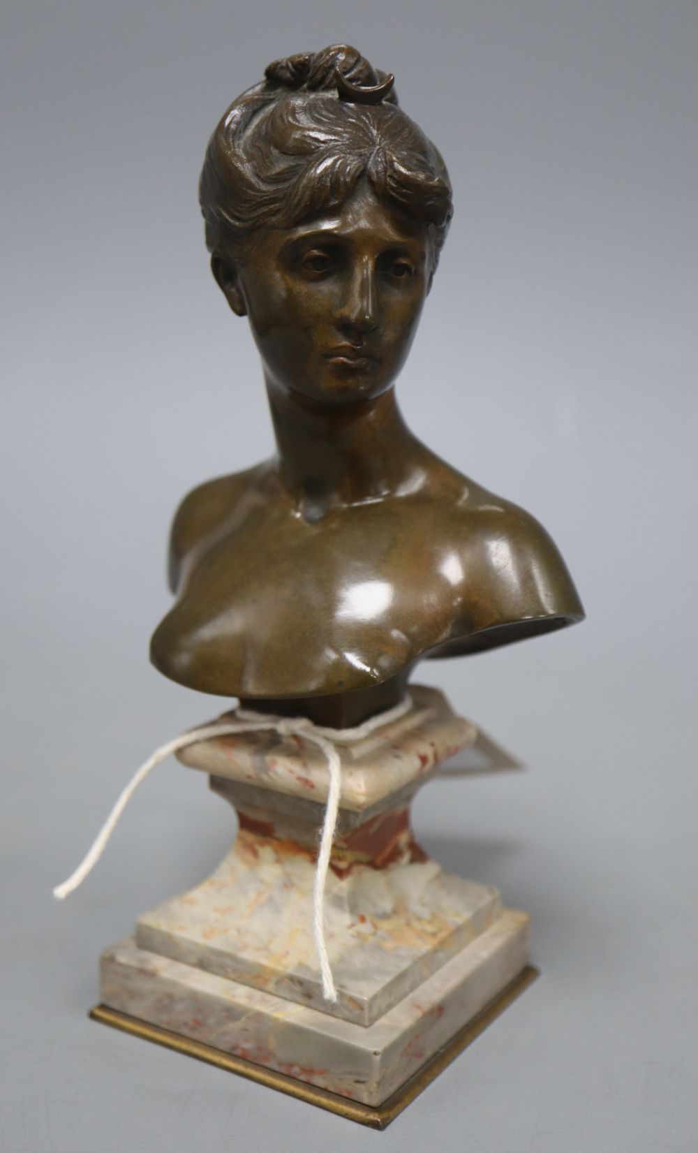 After Moreau. A bronze bust of a young lady, signed, height 19cm